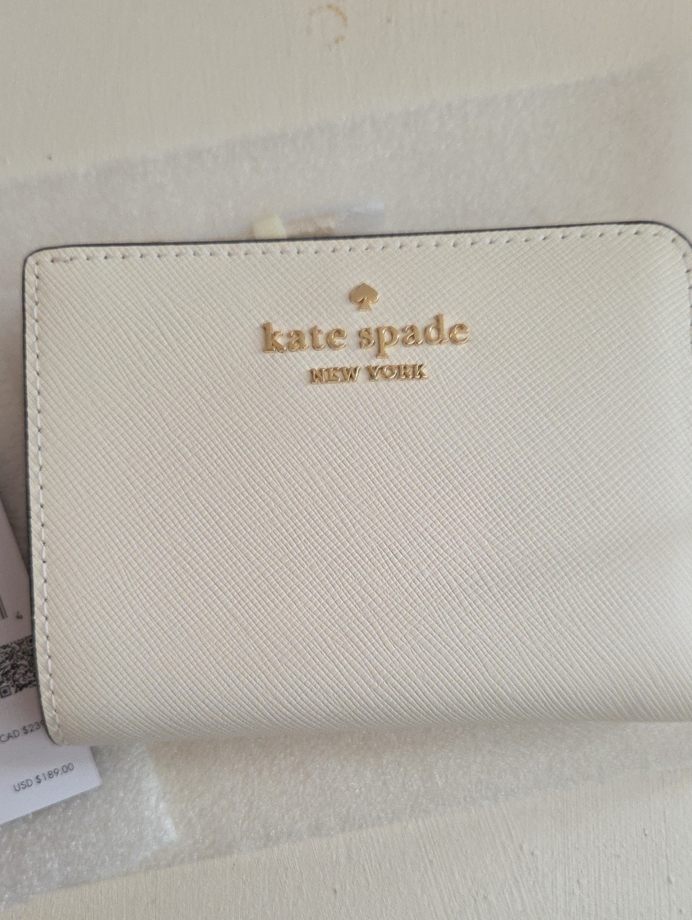 NWT kate spade Cream Leather Bifold Wallet with Gold Logo